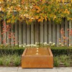 rectangular corten steel water table with fountains